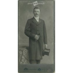   Late 1890s. Studio photo of a young man. The identity of the man in the picture is unknown. The photo was taken in Ödön Uher’s photography studio in Budapest. Original cabinet photo / hardback photo / business card, CDV photo. (2792348)