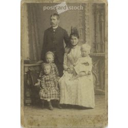   Late 1890s. Unknown young couple with their children, studio photo. The photo was taken in József Fodor’s photography studio in Nagy-Kanizsa. Original  Cabinet card / CDV photo / hardback photo. (2792353)
