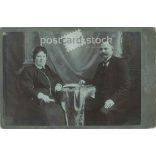Late 1890s. Studio photo of a middle-aged couple. The persons in the picture are unknown. The photo was taken in the photography studio of Weimann and Billner in Budapest. Original  Cabinet card / CDV photo / hardback photo. (2792356)