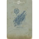 Late 1890s. Studio photo of a middle-aged couple. The persons in the picture are unknown. The photo was taken in the photography studio of Weimann and Billner in Budapest. Original  Cabinet card / CDV photo / hardback photo. (2792356)