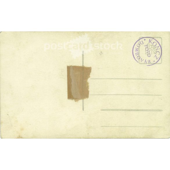 1910s. Young couple in national costume. Made in the Koncz photography studio in Dombóvár. Black and white paper image. Old postcard, photo sheet. (2792375)