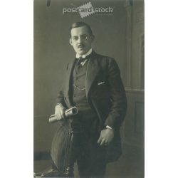   Studio recording of Elegant gentleman. Made by Anglo-American Photographers in a photographic studio in Vienna. Black and white paper image. Old postcard, photo sheet. (2792376)