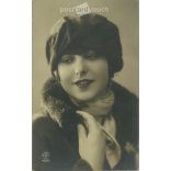 1927 - Romantic old postcard. Paris. Young lady in a fur coat. Sepia photo sheet. (2792385)