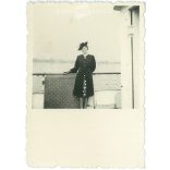 1930s. Young woman in a hat on a boat. Black and white original paper image, old photo. (2792403)
