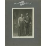 Early 1900s. Railway couple. Black and white original cashier paper image, old photo. The picture was taken by Gizella Kulcsár, in Vác. (2792409)