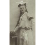 1905 - Girl with a bow, in white. Szombathely. Black and white original cashier paper image, old photo. The picture was taken by Tódor Szilárd’s photography studio. (2792412)