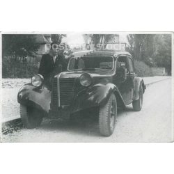   1930s. Parking car and its driver. Its maker is unknown. Black and white original paper image, old photo. (2792414)