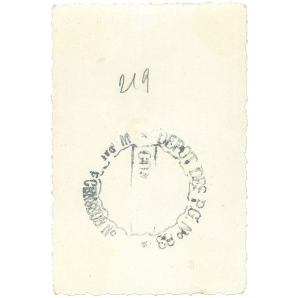 1950s. Young guys give each other fire. Its maker is unknown. Black and white original paper image, old photo. (2792421)