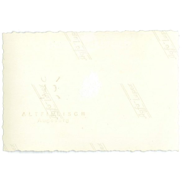 1950s. Germany. A young boy stands in front of a car in the mountains. The creator of the image is unknown. Black and white original paper image, old photo. (2792427)