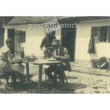 1931 - Germany. Family lunch in front of the house. Visiting parents in the countryside. Its maker is unknown. Black and white original paper image, old photo. (2792437)