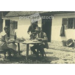   1931 - Germany. Family lunch in front of the house. Visiting parents in the countryside. Its maker is unknown. Black and white original paper image, old photo. (2792437)