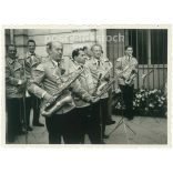 1958 - Germany. Brass band. The picture was taken in Hamburg. Its maker is unknown. Black and white original paper image, old photo. (2792442)