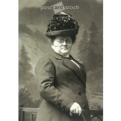   1960s. Germany. Elegant lady in hat with zwicker. Cut out postcard. Black and white reprint from an old photo. (2792458)
