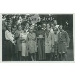 1932. Germany. Young girls with priest. Black and white original paper image, old photo. (2792463)