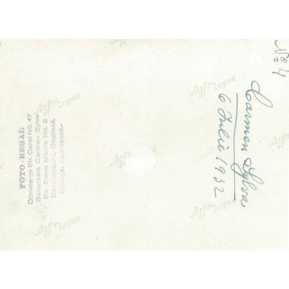 1932. Germany. Young men with a boat on the sea. The picture was taken by the Foto Regal studio. Black and white original paper image, old photo. (2792465)