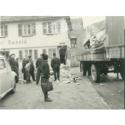  1960s. Germany. A truck crashing into a house. The picture was taken by the Remons studio. Black and white original paper image, old photo. (2792466)