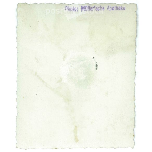 1920s. Germany. Young man on a stationary motorbike. The picture was taken by Müller sche apotheke. Black and white original paper image, old photo. (2792475)