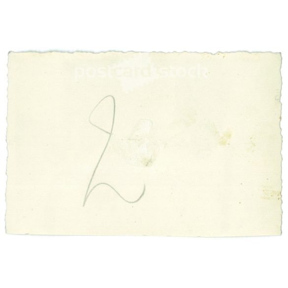 1960s. Germany. Children with snowman. Black and white original paper image, old photo. (2792479)