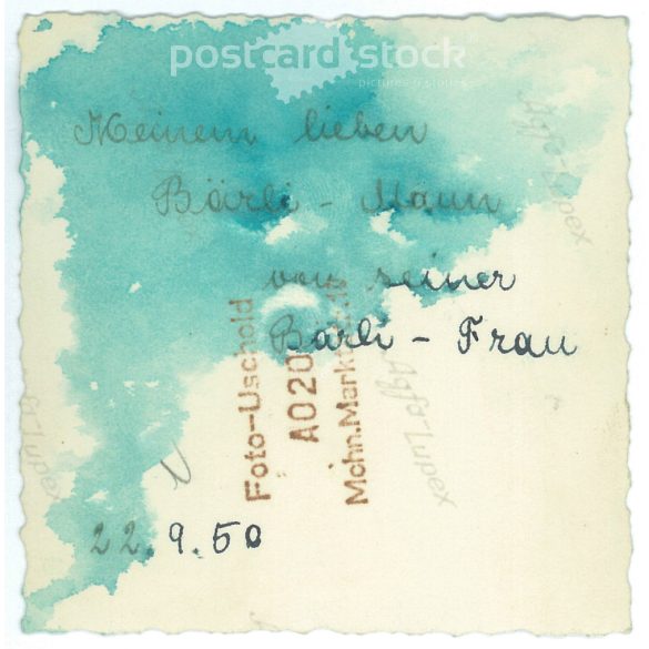 1950. Germany. Young ladies on a stationary motorcycle. The picture was taken by Foto-Uschold. Black and white original paper image, old photo. (2792489)