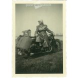 1952. Germany. Young lady with motorbike. The creator of the picture and the person on it are unknown. Black and white original paper image, old photo. (2792506)
