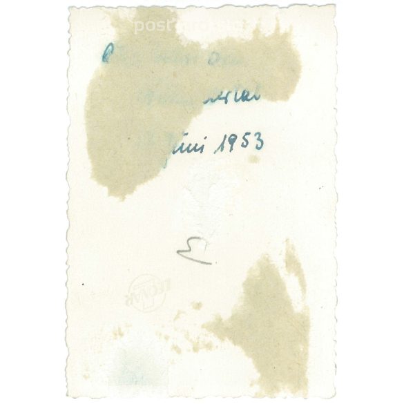 1953. Germany. Young lady with motorbike. The creator of the picture and the person on it are unknown. Black and white original paper image, old photo. (2792507)