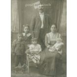 Early 1900s. A full-length studio shot of a married couple and their five children. Made by K. Kerpit’s photography studio, Mezőtúr. Old photo, original cabinet photo / hardback photo. (2792556)