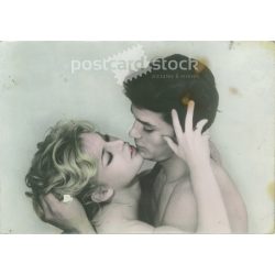   Brigitte Bardot and Alain Delon are movie stars. Original paper image. Old photo. Colored photo sheet, old postcard. (2792641)