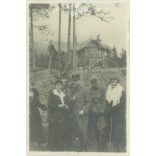 1920s. Hungary. Soldiers in the company of ladies. The creator of the picture and the identity of the people on it are unknown. Black and white original paper image, old photo. (2792666)