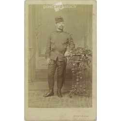   Late 1870s. Full-length studio photo of a soldier. The person in the picture is unknown. Original paper image. The photo was taken in the photography studio of Gondy and Egey. in Debrecen. Old photo, business card, CDV photo. (2792676)