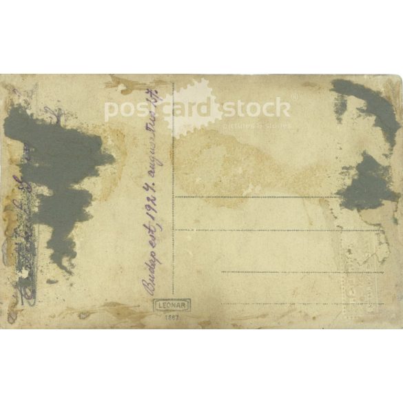 1927. Young woman with flowers. The work of the Mona Lisa photo studio. Original paper image. Old photo. Black and white photo sheet, old postcard. (2792721)