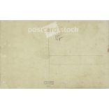 In folk costume. The persons in the picture are unknown. Original paper image. Old photo. Black and white photo sheet, old postcard. (2792754)