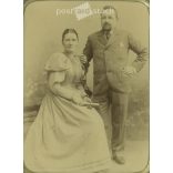 Late 1800s. Studio photo of a middle-aged couple. The identity of the people in the picture and the creator of the picture are unknown. Old photo, original cabinet photo / hardback photo. (2792773)