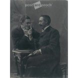 Around 1900. Studio shot of elegant young men. The identity of the people in the picture and the creator of the picture are unknown. Original paper image. Old photo. Black and white photo sheet, old postcard, cut. (27925785)
