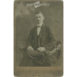   Early 1900s. Studio photo of a young man. The persons in the picture are unknown. The work of the photography studio of Lipót Ganz. Budapest. Old photo, original cabinet photo / hardback photo. (2792790)