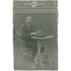   Man with a dulcimer. The person in the picture and the photographer are unknown. Original old photo. Black and white photo sheet, old postcard. (2792806)