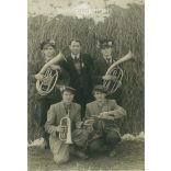 1957 - Cheerful group in front of the haystack. The people in the picture and the photographer are unknown. Old photo. Black and white photo, original paper image. (2792792)