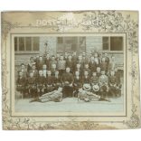 Class photo with cap. The people in the photo and the photographer are unknown. Original old photo. Black and white, laminated photo, original paper photo. (2792812)