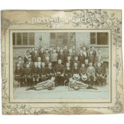   Class photo with cap. The people in the photo and the photographer are unknown. Original old photo. Black and white, laminated photo, original paper photo. (2792812)