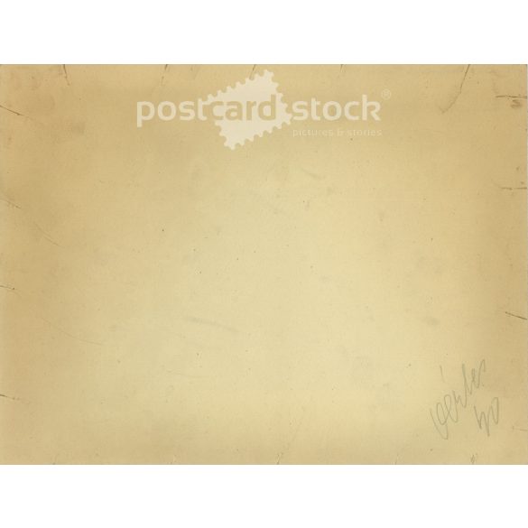 Class photo with charismatic teacher. The people in the photo and the photographer are unknown. Original old photo. Black and white, laminated photo, original paper photo. (2792813)