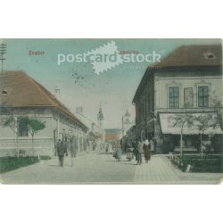   1909 - Zrínyi Street, Sombor. The people in the picture and the creator of the picture are unknown. Original paper picture. Colored photo, old postcard. (2792819)