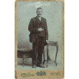 Young man with a cigarette. The person in the picture and the person who took the picture are unknown. Old photo / Cabinet photo / Hardback photo (2792908)