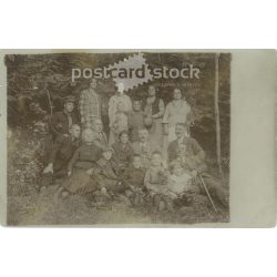   Family group photo outdoors. The people in the picture and the artist are unknown. Original on paper, black and white photographic paper, postcard. (2792966)
