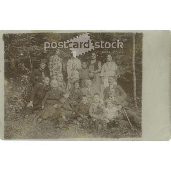 Family group photo outdoors. The people in the picture and the artist are unknown. Original on paper, black and white photographic paper, postcard. (2792966)