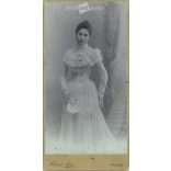 Studio full-length photo of an elegant young lady. The identity of the subject is unknown. The photo was taken in the studio of Alajos Klapok in Arad. Old photo / Cabinet photo / Hardback photo (2793012)