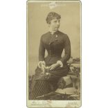 Late 1800s. Studio photograph of an unknown young girl. The picture was taken in the studio of Mai and Company. Old photo / Cabinet photo / Hardback photo (2793143)