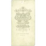 Late 1800s. Studio photograph of an unknown young girl. The picture was taken in the studio of Mai and Company. Old photo / Cabinet photo / Hardback photo (2793143)