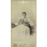 Unknown young lady with a fan. The photo was taken in the Mai & Társa photo studio in Budapest. Old photo / Cabinet photo / Hardback photo (2793180)