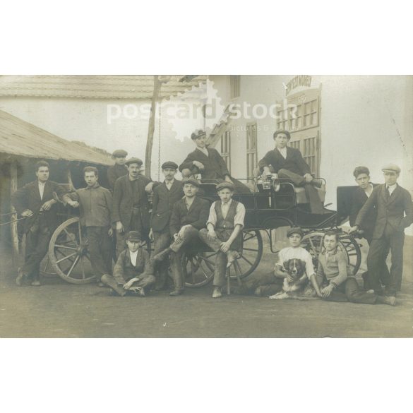 Early 1900s. Workers in a car polishing workshop. Original on paper. Black and white photo sheet, postcard. (2793326)