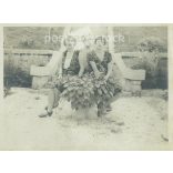 1920s. Family group photo in the park. Mother with her daughters. The people in the photo and the photographer are unknown. Black and white photo, original paper print. (2793409)