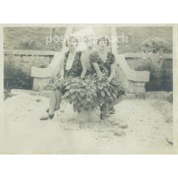   1920s. Family group photo in the park. Mother with her daughters. The people in the photo and the photographer are unknown. Black and white photo, original paper print. (2793409)